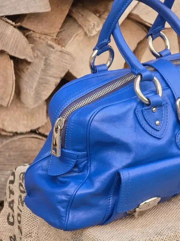 Skórzana torebka typu kuferek – klasyczna elegancja - karenlike.com