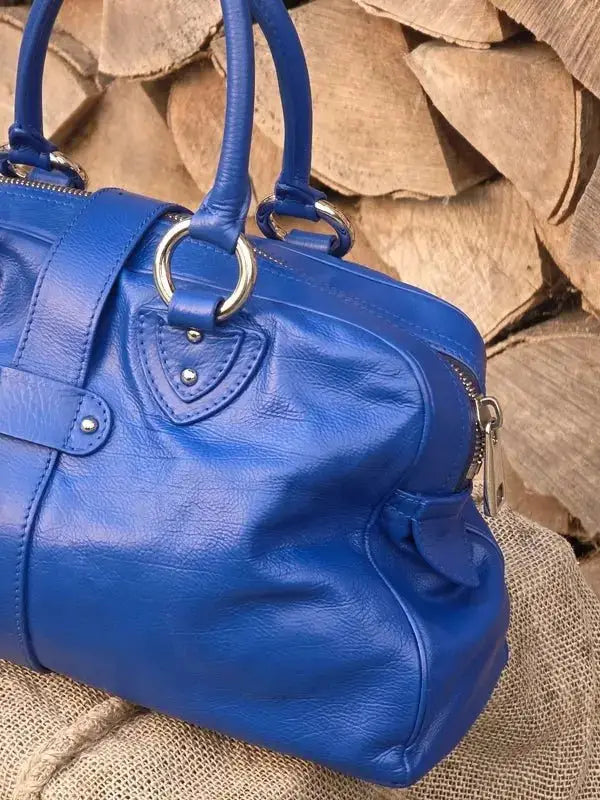 Skórzana torebka typu kuferek – klasyczna elegancja - karenlike.com