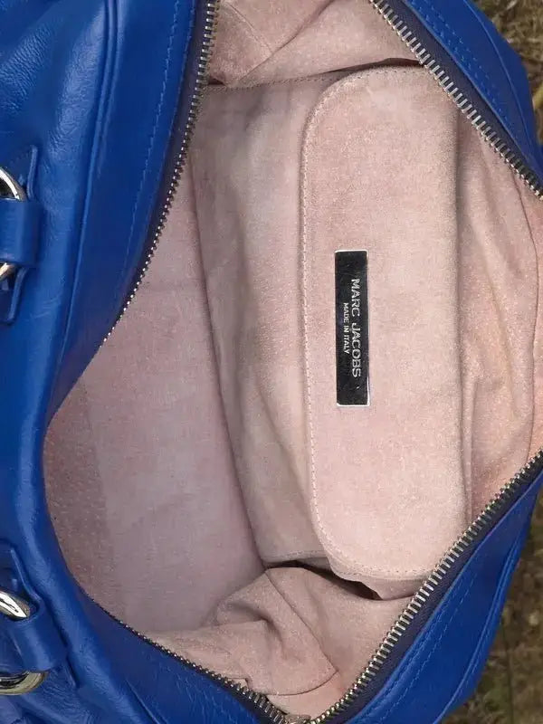 Skórzana torebka typu kuferek – klasyczna elegancja - karenlike.com