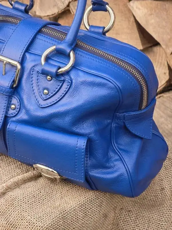 Skórzana torebka typu kuferek – klasyczna elegancja - karenlike.com