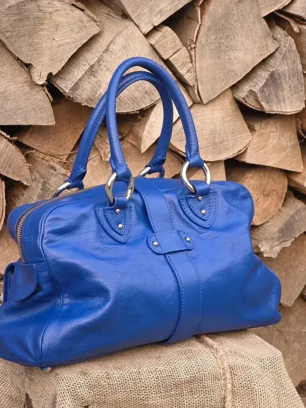 Skórzana torebka typu kuferek – klasyczna elegancja - karenlike.com