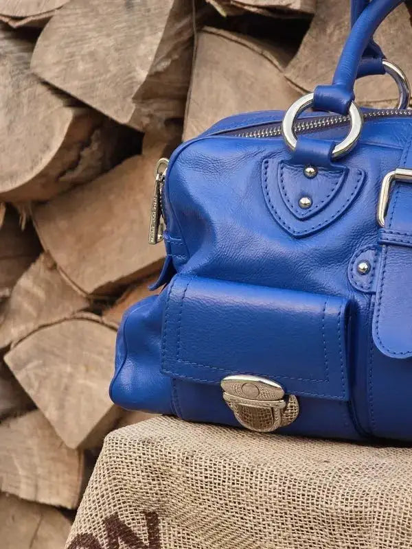 Skórzana torebka typu kuferek – klasyczna elegancja - karenlike.com