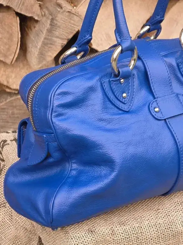 Skórzana torebka typu kuferek – klasyczna elegancja - karenlike.com