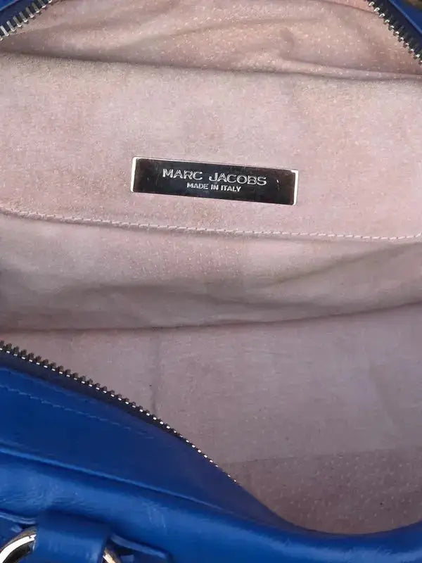 Skórzana torebka typu kuferek – klasyczna elegancja - karenlike.com