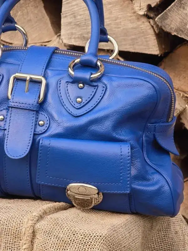 Skórzana torebka typu kuferek – klasyczna elegancja - karenlike.com