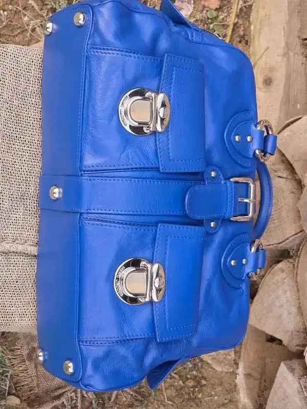 Skórzana torebka typu kuferek – klasyczna elegancja - karenlike.com