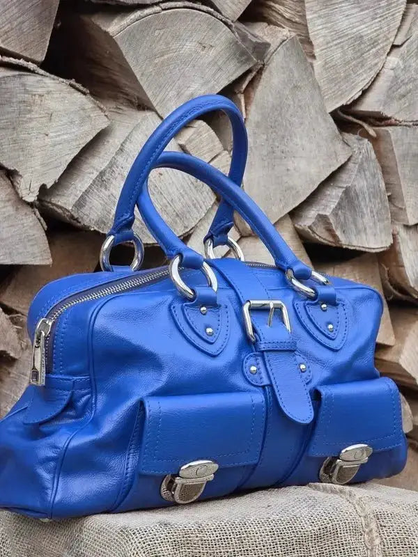 Skórzana torebka typu kuferek – klasyczna elegancja - karenlike.com