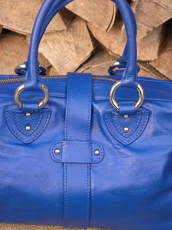 Skórzana torebka typu kuferek – klasyczna elegancja - karenlike.com