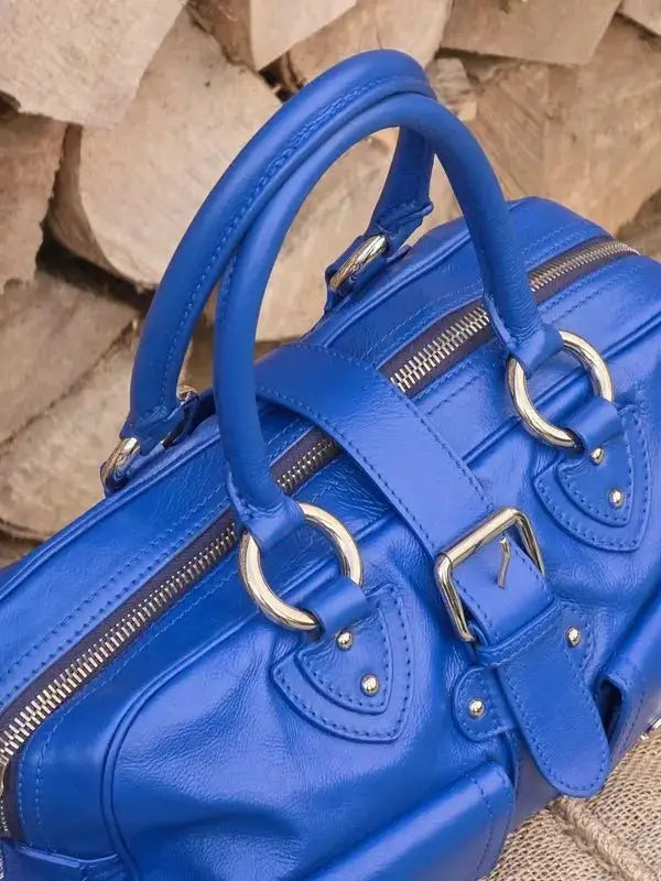 Skórzana torebka typu kuferek – klasyczna elegancja - karenlike.com